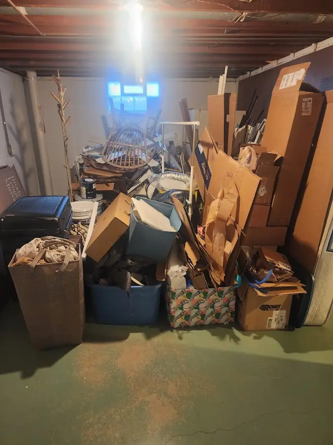 Roll-off dumpster container at job site for 15 Yard Dumpster Rental in Harbor Bluffs